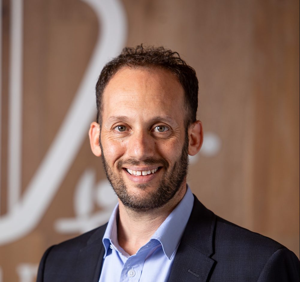 Principal Marc Light looks at the camera, he is smiling