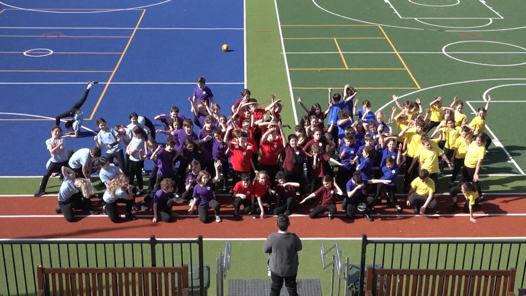 Students acting in the drama production Meshuga Primary