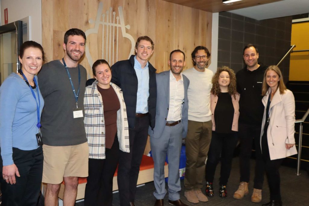 Alumni pose with our Principal Marc Light - they have returned to KDS to give careers advice to current students