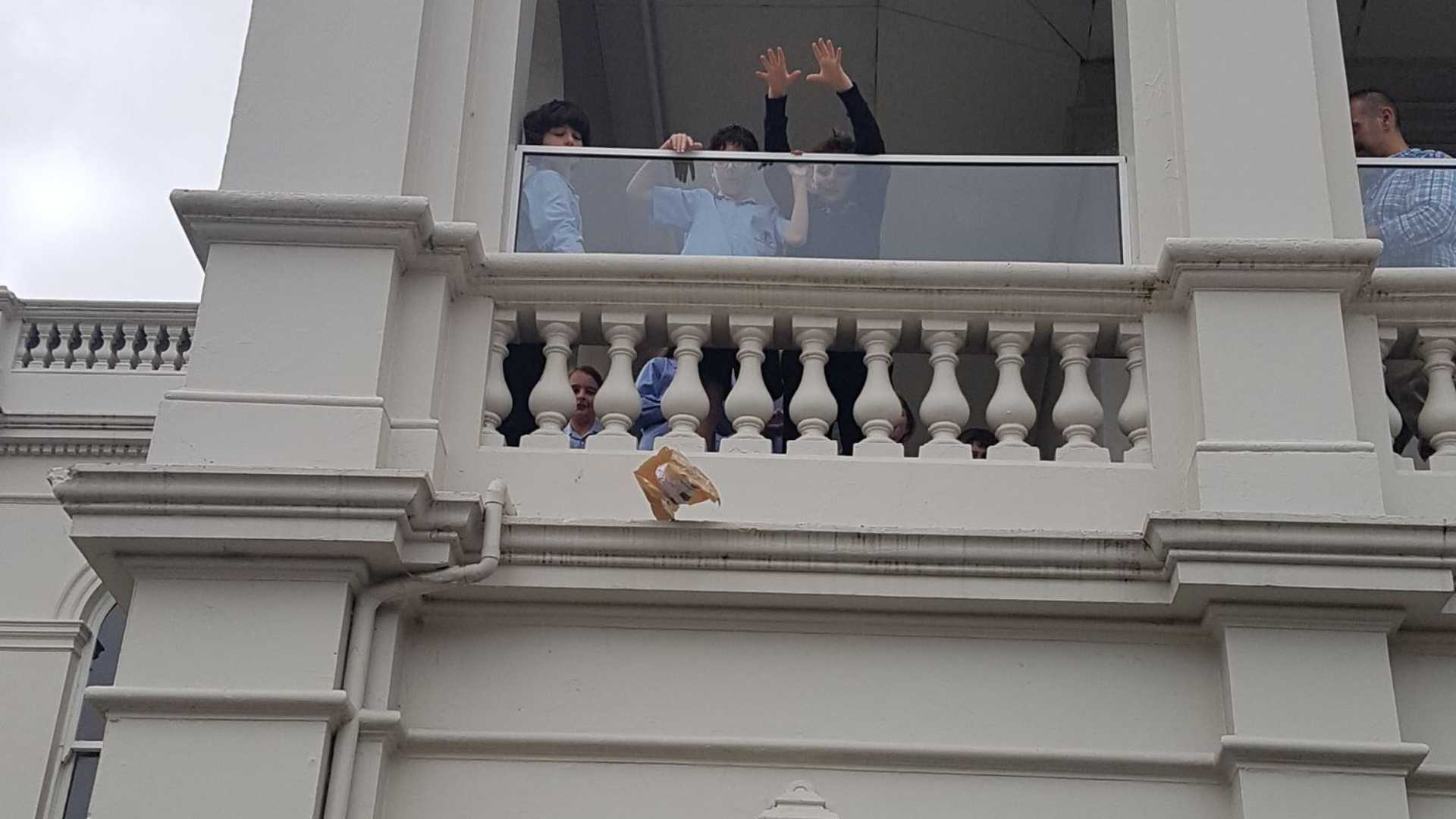Year 4 students drop an egg off the balcony of the mansion at our Dandenong Rd campus. They are learning about forces.