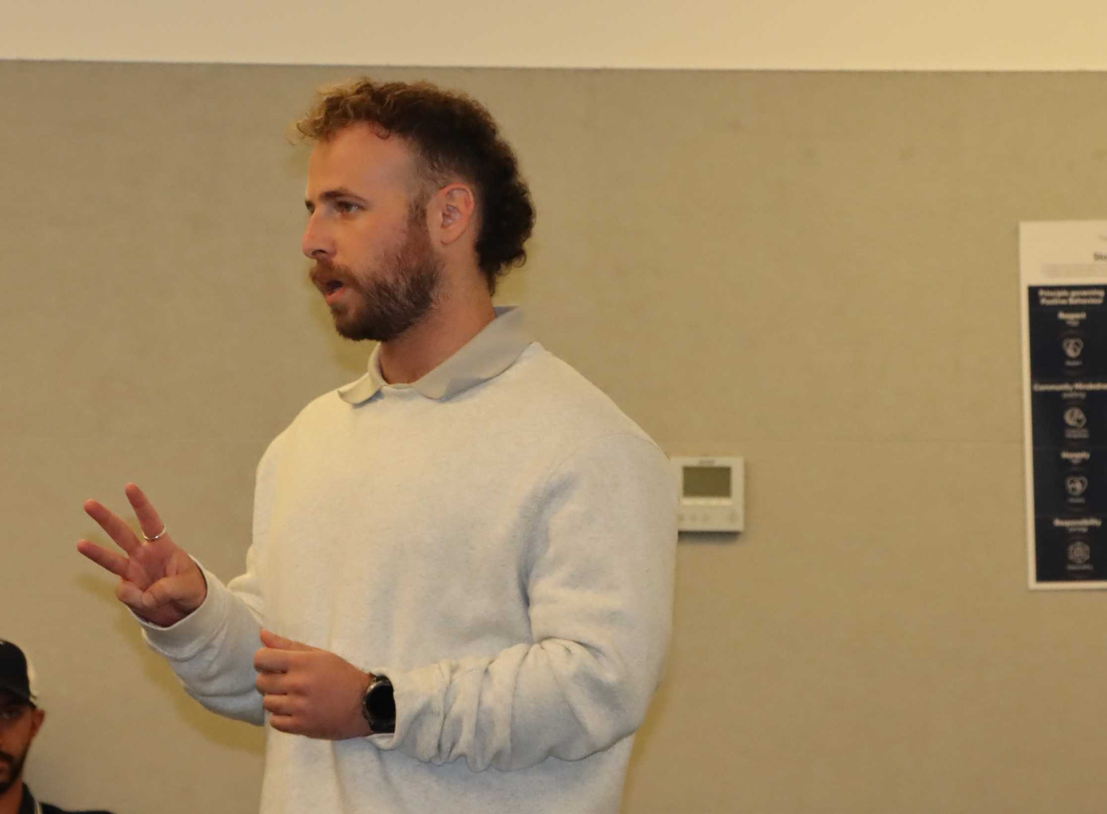 Commander Liam addresses Year 10 students. He is telling them what life is like as an injured soldier.