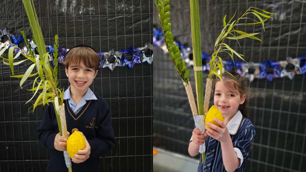 Prep students hold the etrog and lulav in the sukkah - they are smiling because they are happy to fulfil the mitzvah of being in the sukkah and of shaking the lulav.