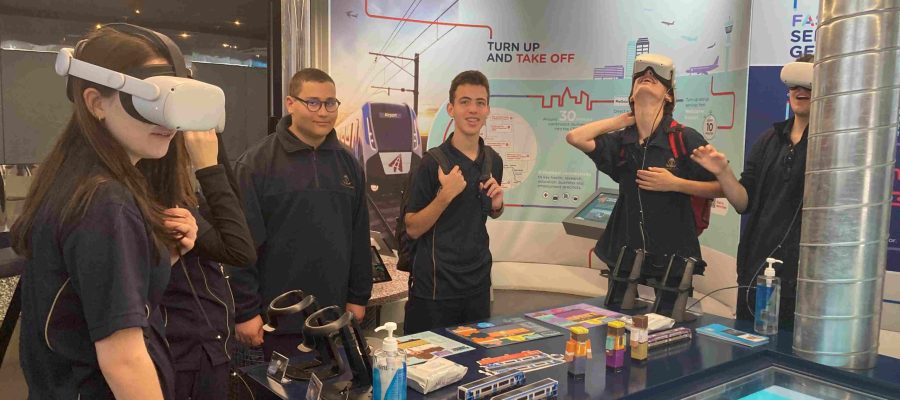 Five students are exploring sustainable architecture through VR technology - they are wearing VR headsets